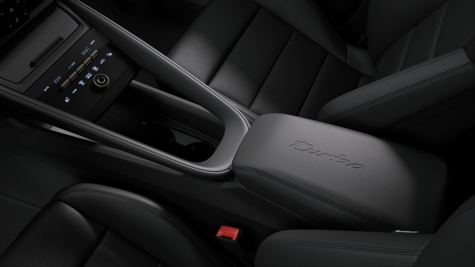 Model Logo embossed on Centre Console Armrests